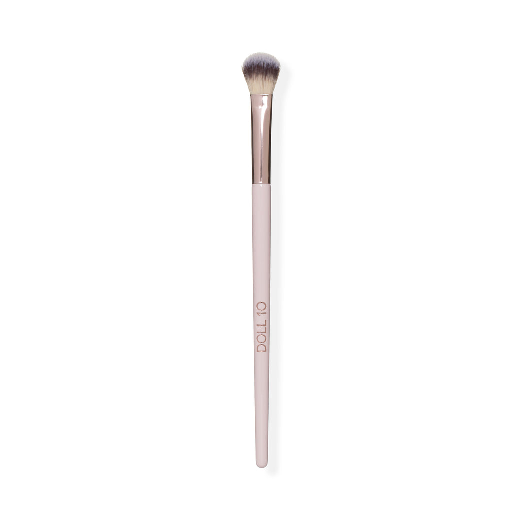 deluxe eyeshadow blending blush with light pink handle and rose gold accent