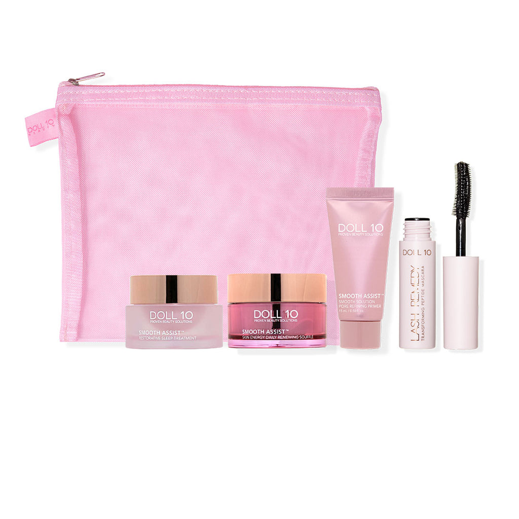 travel size deluxe kit showing mesh bag and 4 travel size products - restorative night cream, daily souffle, pore primer and lash remedy mascara. TSA approved. 