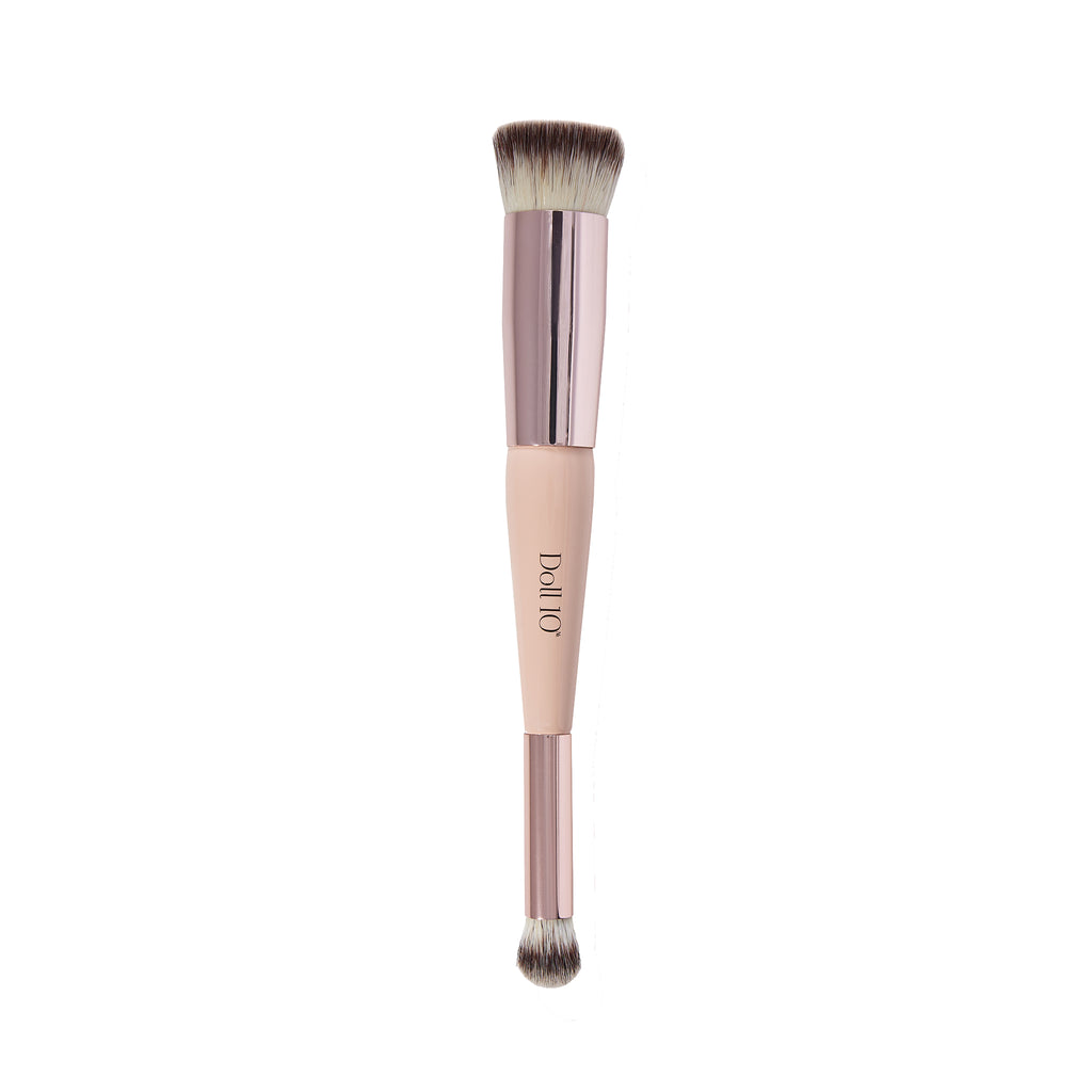 image of brush with two ends - one smaller brush for eyeshadow and one larger end for complexion