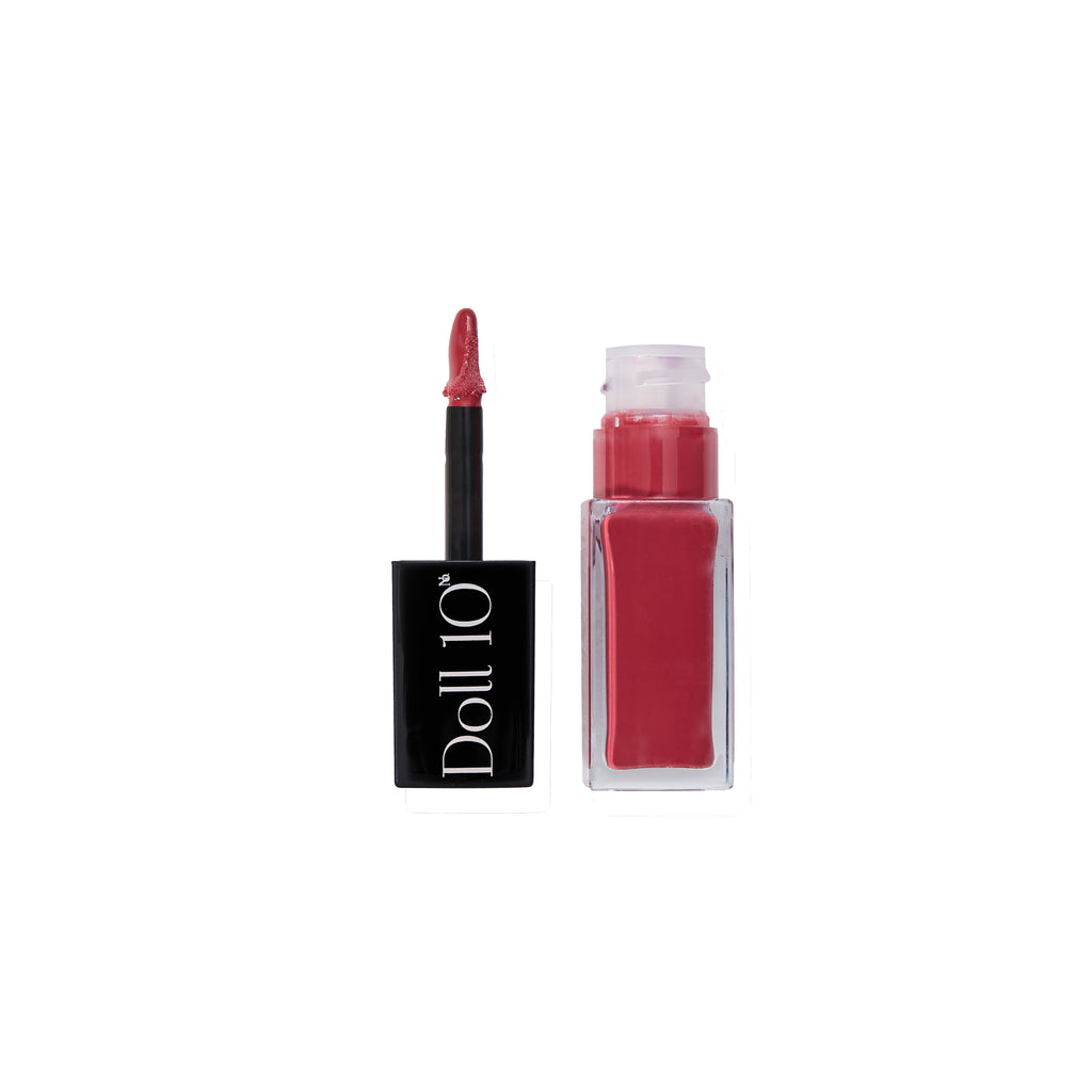 high shine liquid lip gloss in shade one of a kind with application wand